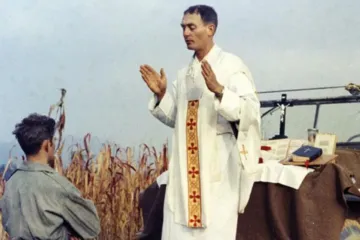 Father Emil Kapaun celebrates Mass